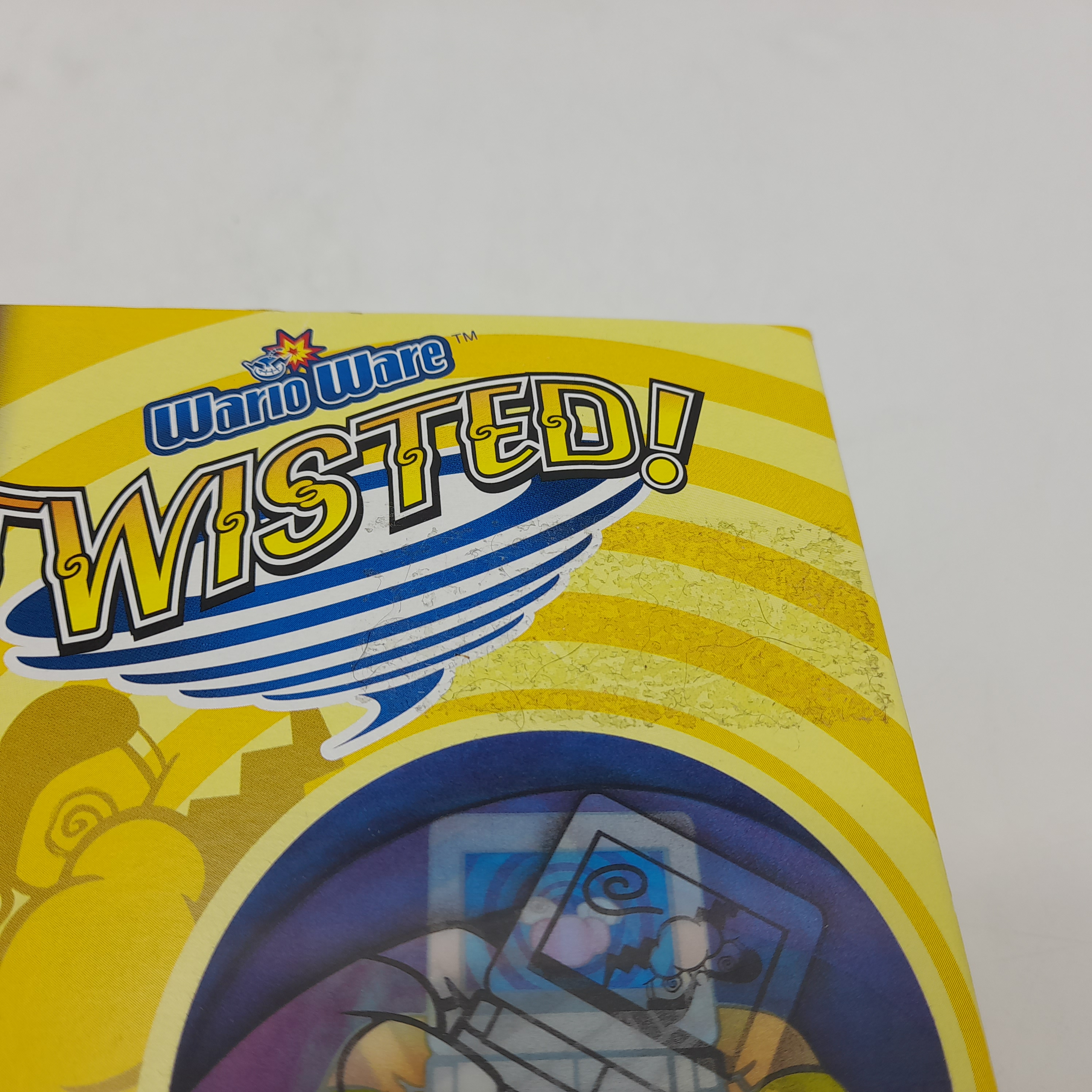 Foto van Wario Ware Twisted Compleet